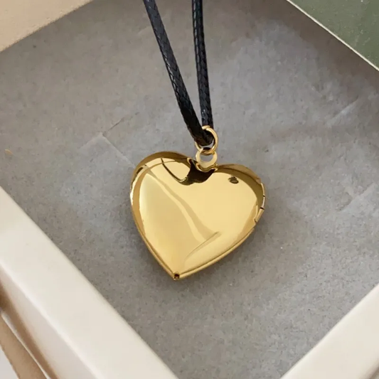 RELICARIO EN FORMA DE CORAZON-1